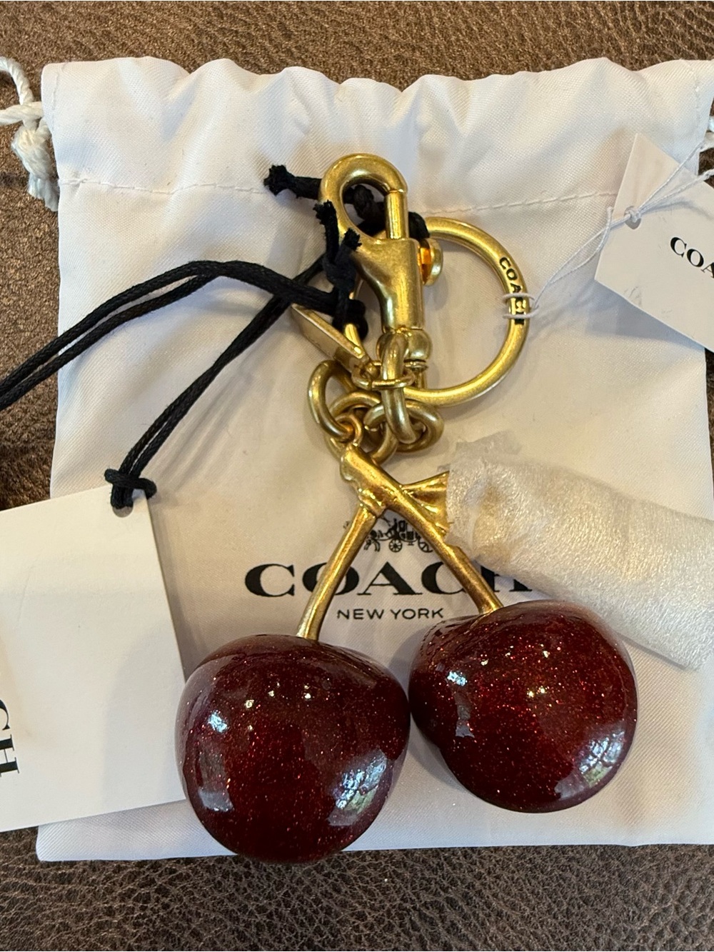 COACH Glitter Cherry Key Charm in Deep Red with Gold Hardware